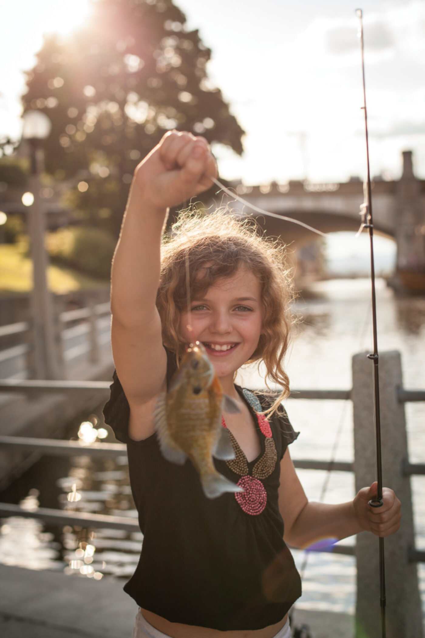 Canada Rideau Canal Girl Fishing Credit Canadian Tourism Commission